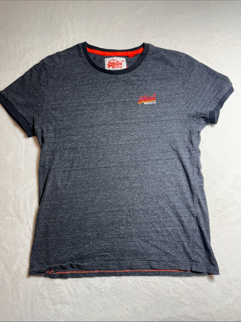 Vintage Superdry Women's Black Heathere Short Sleeve Crew Tee with Orange Accent